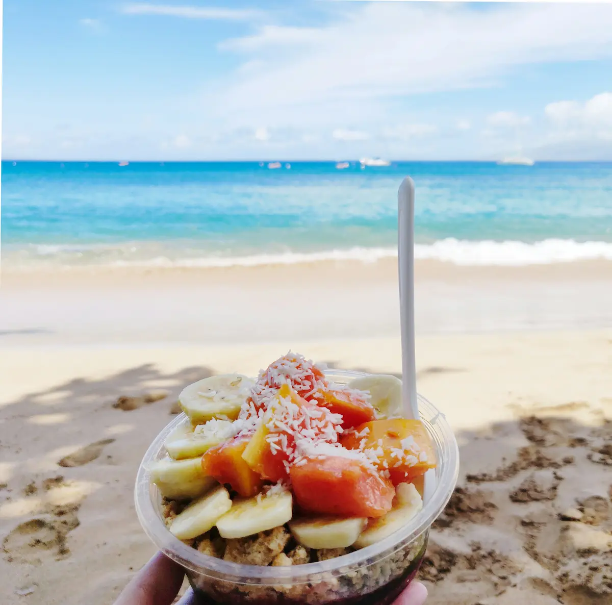 Eating an Acai bowl on the North shore Of Oahu hawaii